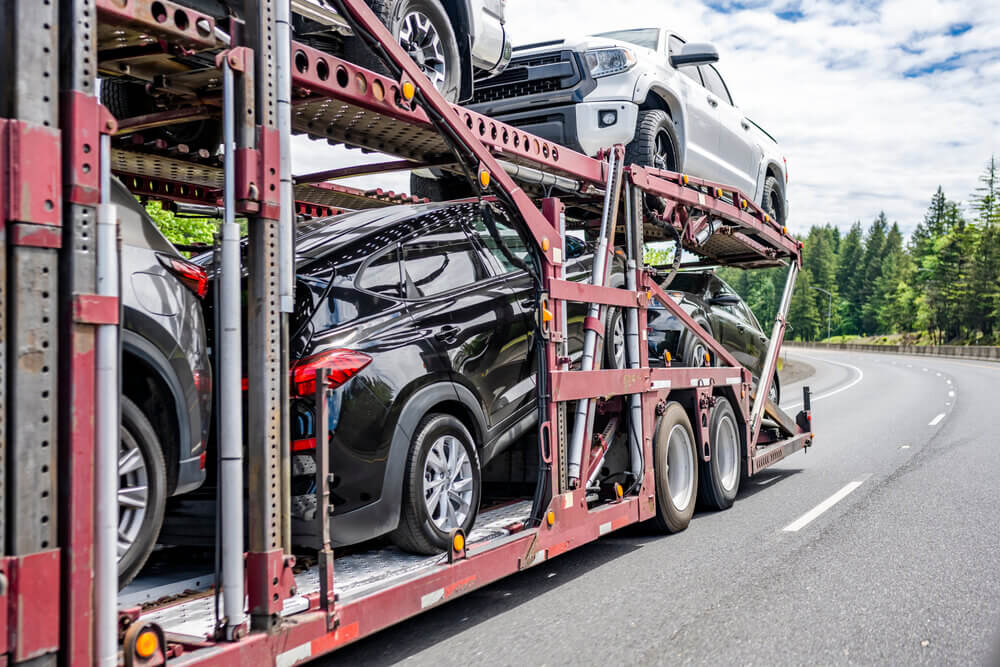 A Car Securely Loaded On An Auto Transport Truck Texas